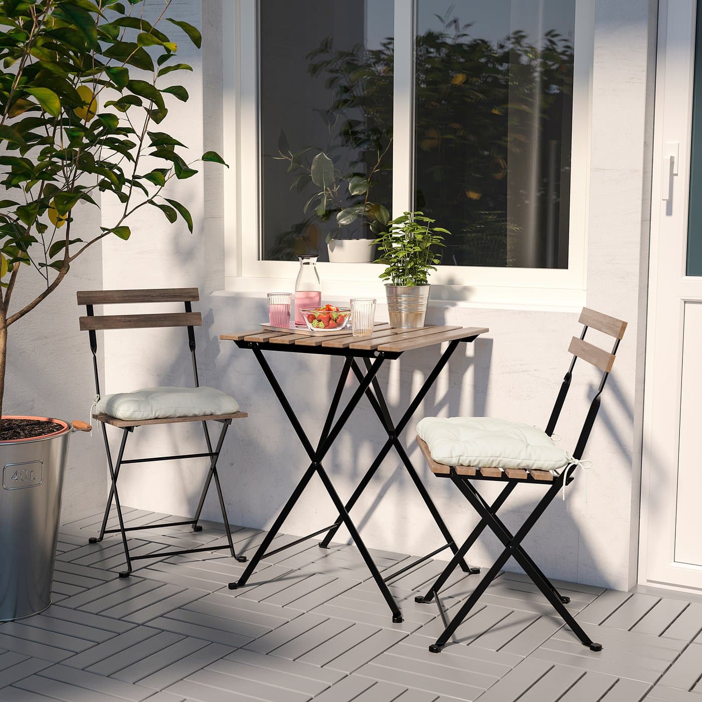 TÄRNÖ Chair, outdoor - foldable black/light brown stained — image 3